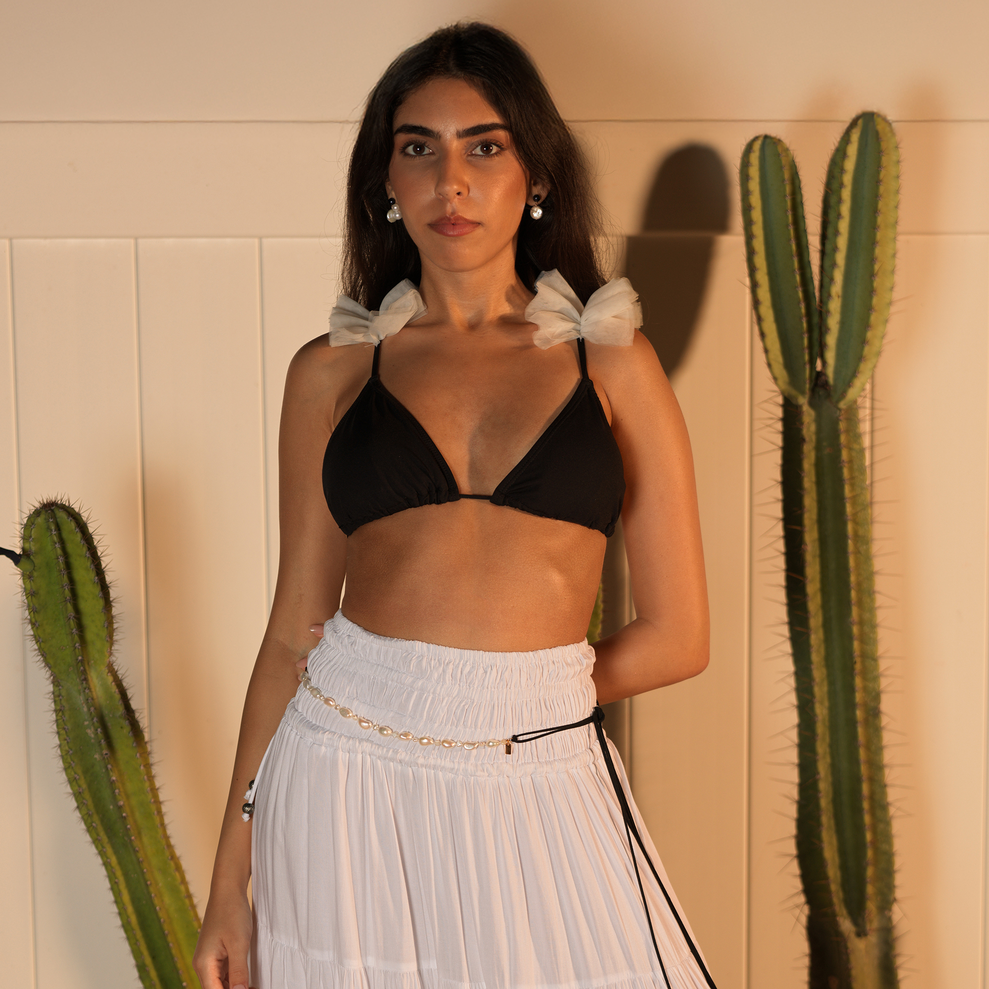 DRIA BLACK & WHITE PEARL DROP EARRINGS & TORY FRESHWATER PEARL BELLY CHAIN – BLACK SUEDE CORD - model